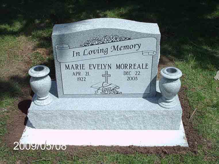Custom upright granite monument crafted by Sierra Headstone & Monument, installed at a family's cemetery